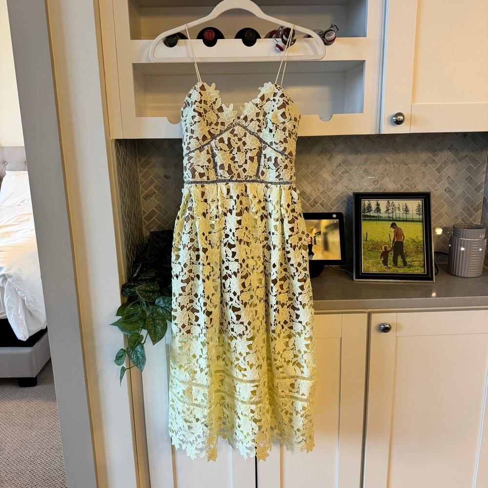 pastel yellow midi dress by self-portrait